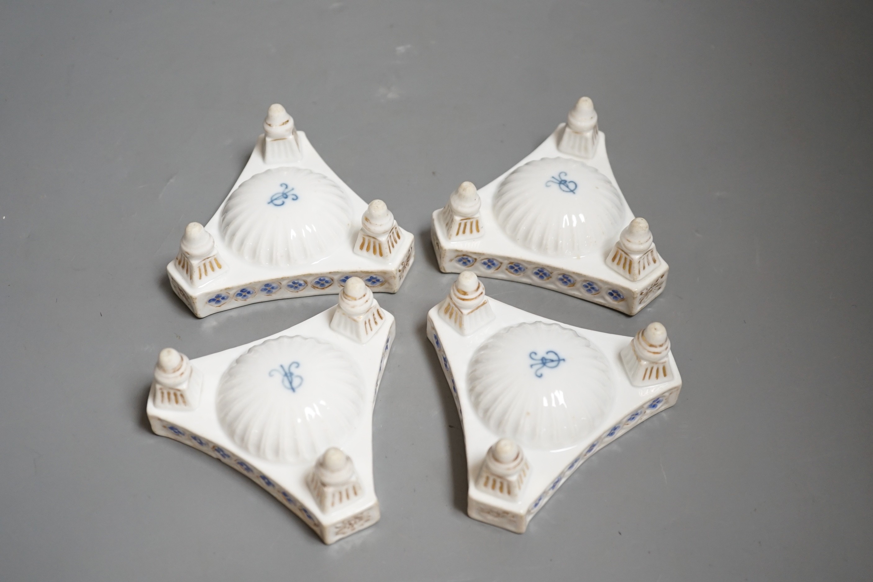 Four late 19th century Dresden porcelain tripod salts, by Helena Wolfsohn, 10cm wide